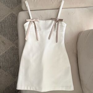 Elegant White Dress with Bow Accents